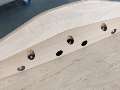 individuell, gefertigte Formteile aus zertifizierten Buchenholz für Sortier-Kippschalen mit Bohrungen zur Befestigung